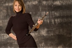 smiling woman with oboe