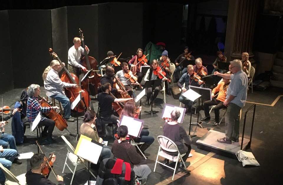orchestra in rehearsal